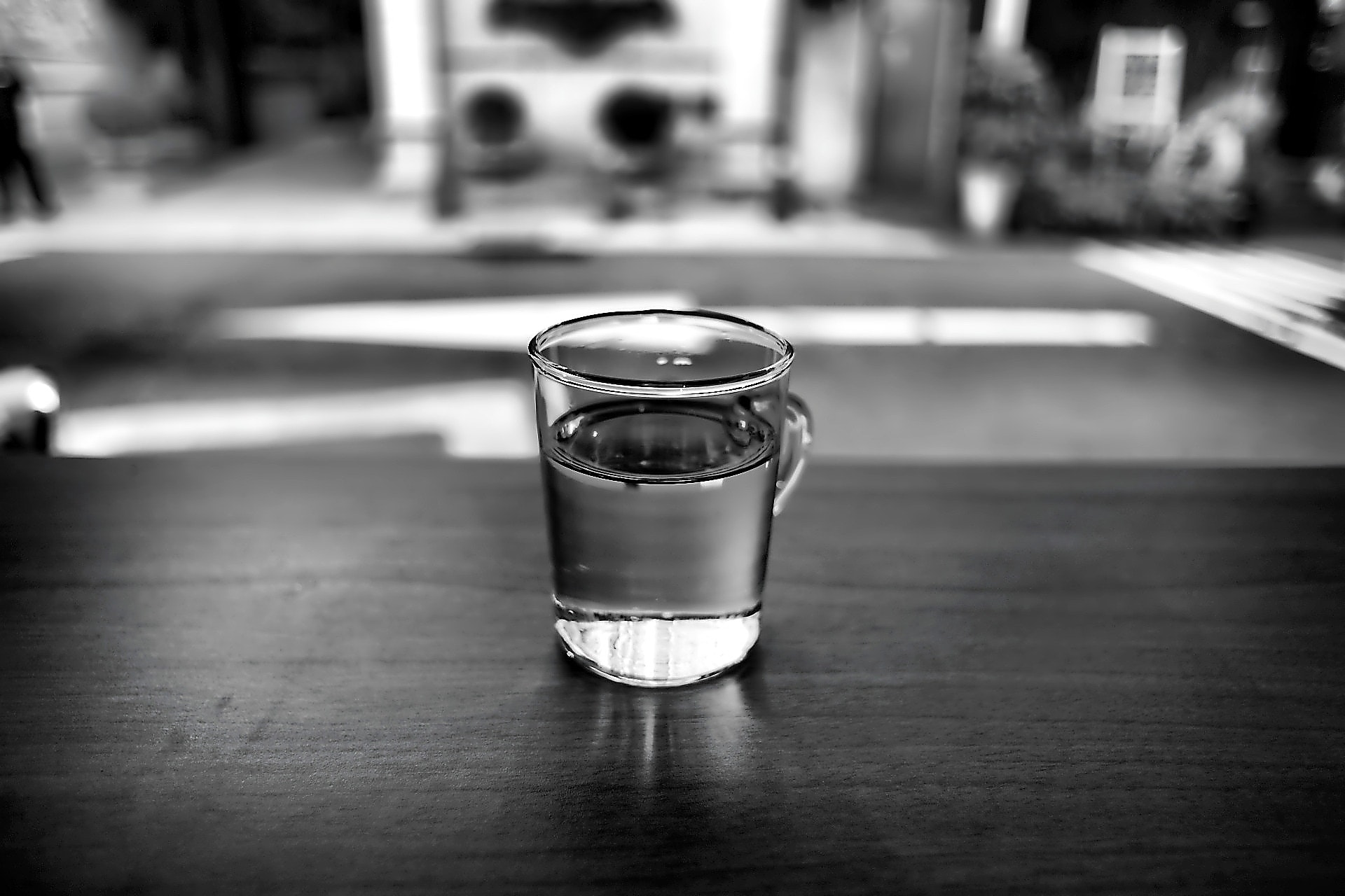 gray-scale-photo-of-glass-with-water-156913